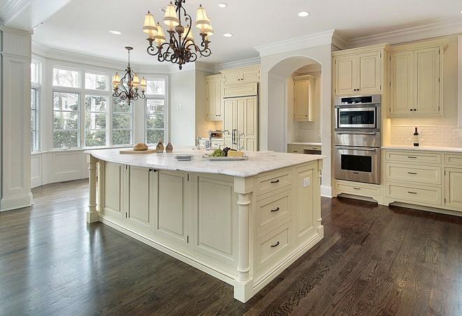 newly installed grey laminate flooring in modern kitchen in Pleasureville